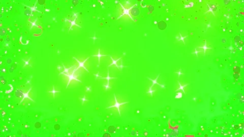 Floating golden glitter particles sparkling against a vibrant green screen Stock Footage 345146092