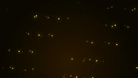 Floating golden particles against a dark black background texture Video stock 335117316