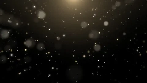 Floating golden particles drifting through dark space with soft glowing light Stock Footage 340941455