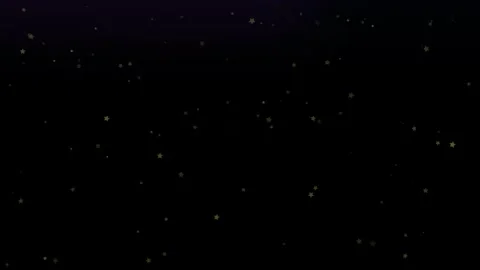 Floating golden star particles drifting across dark gradient background with Видео 344219906