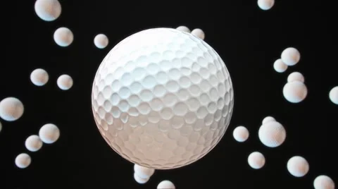 Floating GolfBalls Against Black 库存影片 65992676