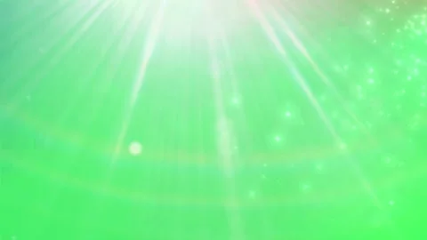 Floating Green Confetti Particles with Glowing Light Rays in a Soft Abstract Stock Footage 338368705