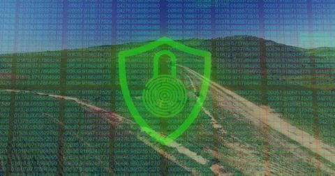 Floating green shield icon with padlock and fingerprint above valley slopes, Stock Photos