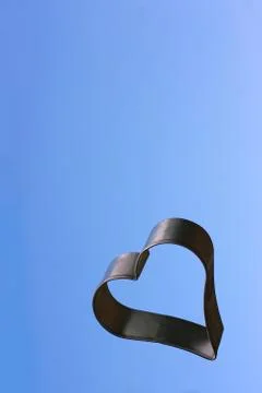 Floating heart with sky background Stock Photos