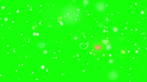 Floating hearts and confetti particles over green screen background for Stock Footage 338388226