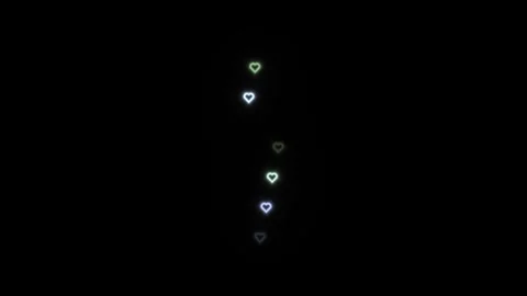 Floating hearts in a dark background create a simple Stock Footage 339355836