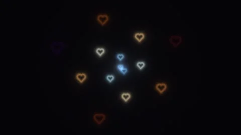 Floating hearts in dark background with glowing effects Vidéo 338192710