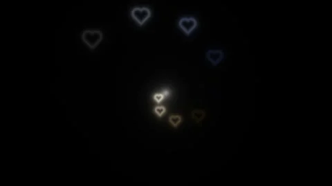 Floating hearts in darkness create glowing shapes Stock Footage 338316968