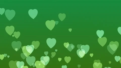 Floating Hearts on Green Background Stock Footage 326712124
