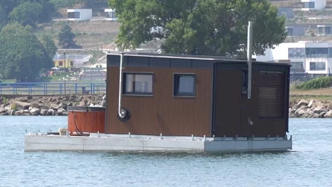 Floating house on the lake Stock Footage 337970516