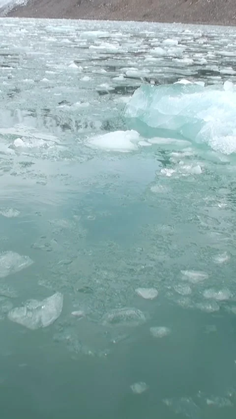 Floating Ice and Glacial Mountains of Svalbard Stock Footage 327292671