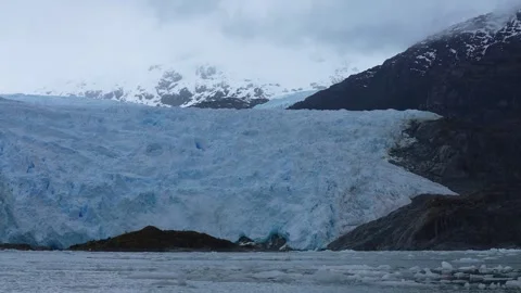 Floating Ice and Glacier on Coast of Antarctica. Massive Ice Field Under Snow Stock Footage 345111625