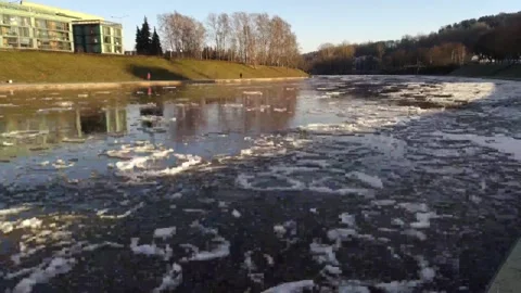 Floating Ice Chunks Drifting Down River 스톡 동영상 347702869