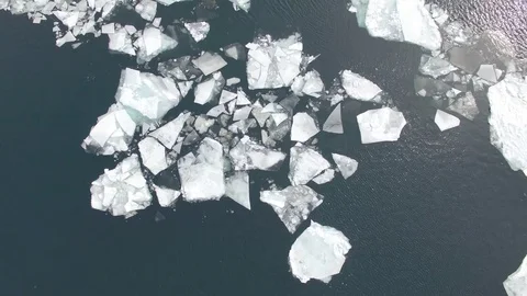 Floating Ice Chunks in Lake Michigan by the Mackinaw Bridge Stock Footage 81884270