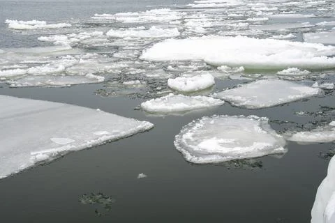 Floating ice chunks in lake Stock Photos