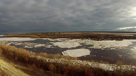 Floating of ice. Floating of ice on spring river Stock Footage 123353172