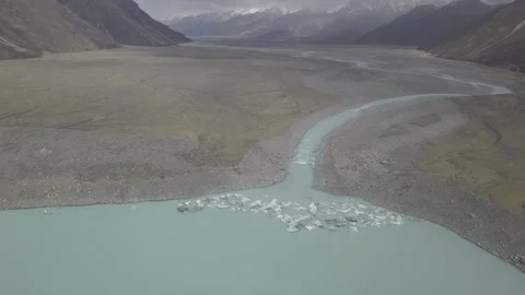 Floating ice at Hooker and Tasman Lakes with Mount Cook in New Zealand. Stock Footage 145793508