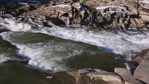 Floating ice in a mountain river Stock Footage 257072971