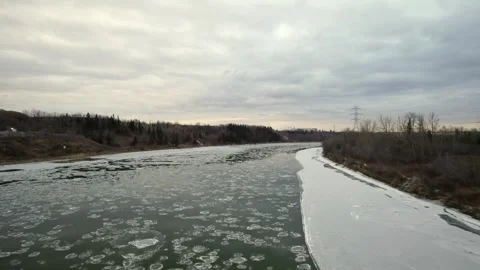Floating Ice on the North Saskatchewan River Stock Footage 257286176
