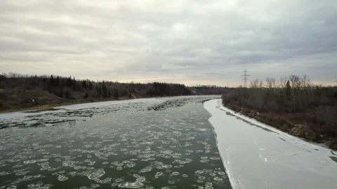 Floating Ice on the North Saskatchewan River Stock Footage 257286192