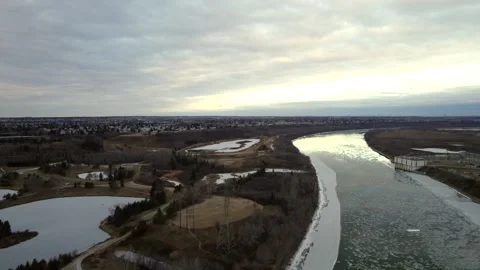 Floating Ice on the North Saskatchewan River Stock Footage 257286343