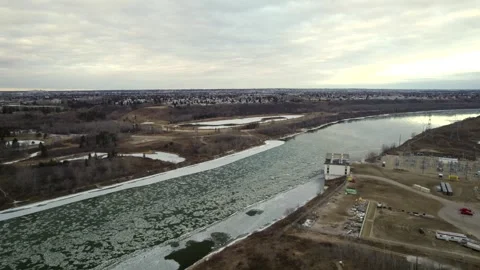 Floating Ice on the North Saskatchewan River Stock Footage 257286401