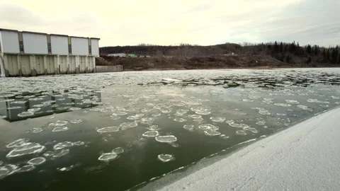 Floating Ice on the North Saskatchewan River Stock Footage 257286499