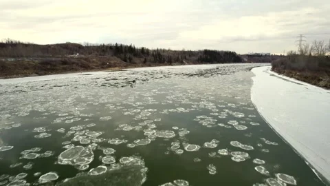 Floating Ice on the North Saskatchewan River Stock Footage 257286561