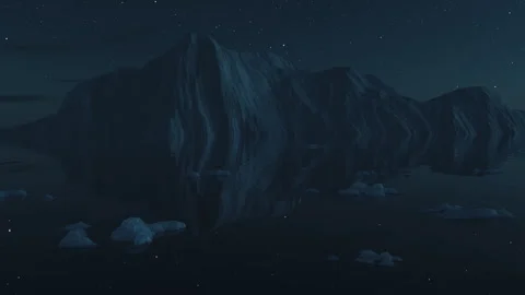 Floating ice plates in front of iceberg at night Stock Footage 241011207