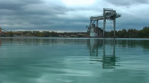 Floating installation for the extraction of pebbles. Video stock 96726061