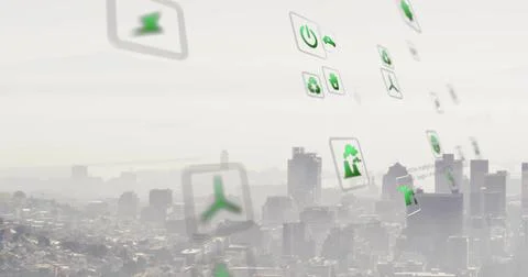 Floating interface icons hovering over urban skyline, showing green power Foto stock