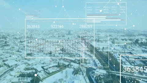 Floating interface overlaying snowy suburb, showing data grids and network nodes Stock Footage 307884261