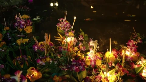 Floating Krathong With Flowers In The Water During The Yi Peng Lantern Festival Stock Footage 295616664