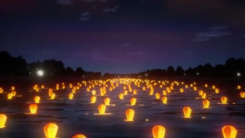Floating Lanterns on Water at Night During Festival Stock Footage 313742441