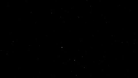 Floating light particle animation isolated on black background Stock Footage 328587479