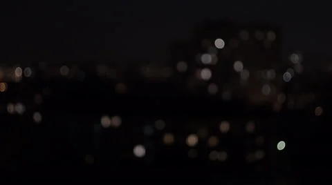 Floating light spot in the Windows night city. Stock Footage 41606404