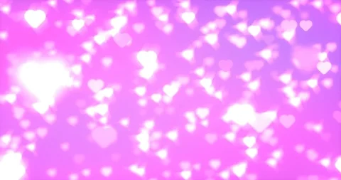 Floating luminous hearts seamless loop Stock Footage 101582188