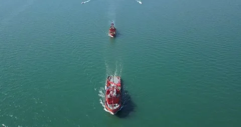A floating modern ship sprays jets of water Stock Footage 134262045