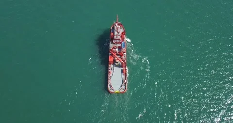 A floating modern ship sprays jets of water Stock Footage 134262120