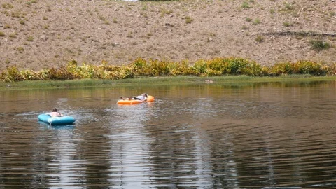 Floating on a mountain lake Video stock 93684237