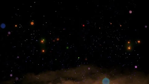 Floating multicolored glowing particles rising above dark smoky ground texture Stock Footage 345330531