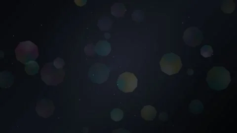 Floating octagonal bokeh particles on dark background Stock Footage 335884143