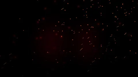 Floating orange embers glowing in darkness creating cinematic atmosphere fo.. Stockbeeldmateriaal 345002965