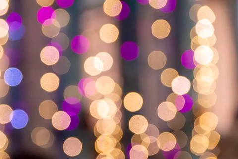 Floating orbs of light between columns evoking themes of mystery, celebration Stock Photos