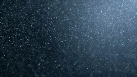 Floating organic dust particles shimmering on a black background. Particles Stock Footage 90444594