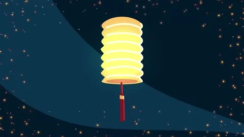 Floating oriental lantern glowing against dark starry night sky background. Stock Footage 338422821