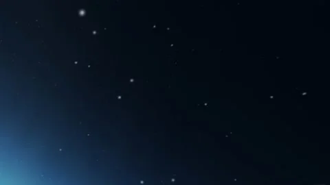 Floating particles on a dark navy background. Christmas snow holiday Video stock 130597587