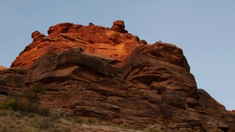 Floating past red rocks Video stock 82540558