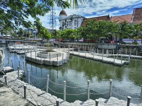 Floating pathways on Kali Besar canal in Jakarta Old Town. Stock Photos