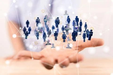Floating people icons and binary code over a hand - a concept of networking, HR, Stock Photos